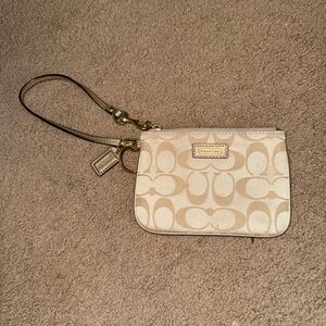 Coach Cream and Tan Clutch with Elegant Design